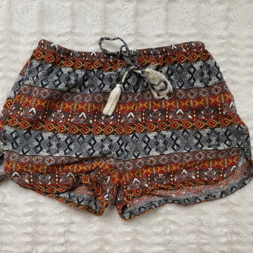 Patterned orange and black lounge shorts size 4